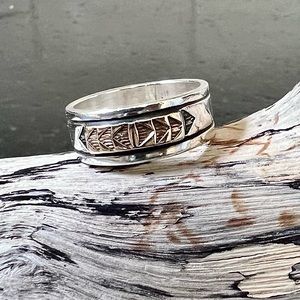 Stamped 14 karat gold and silver ring. Size 7.5.